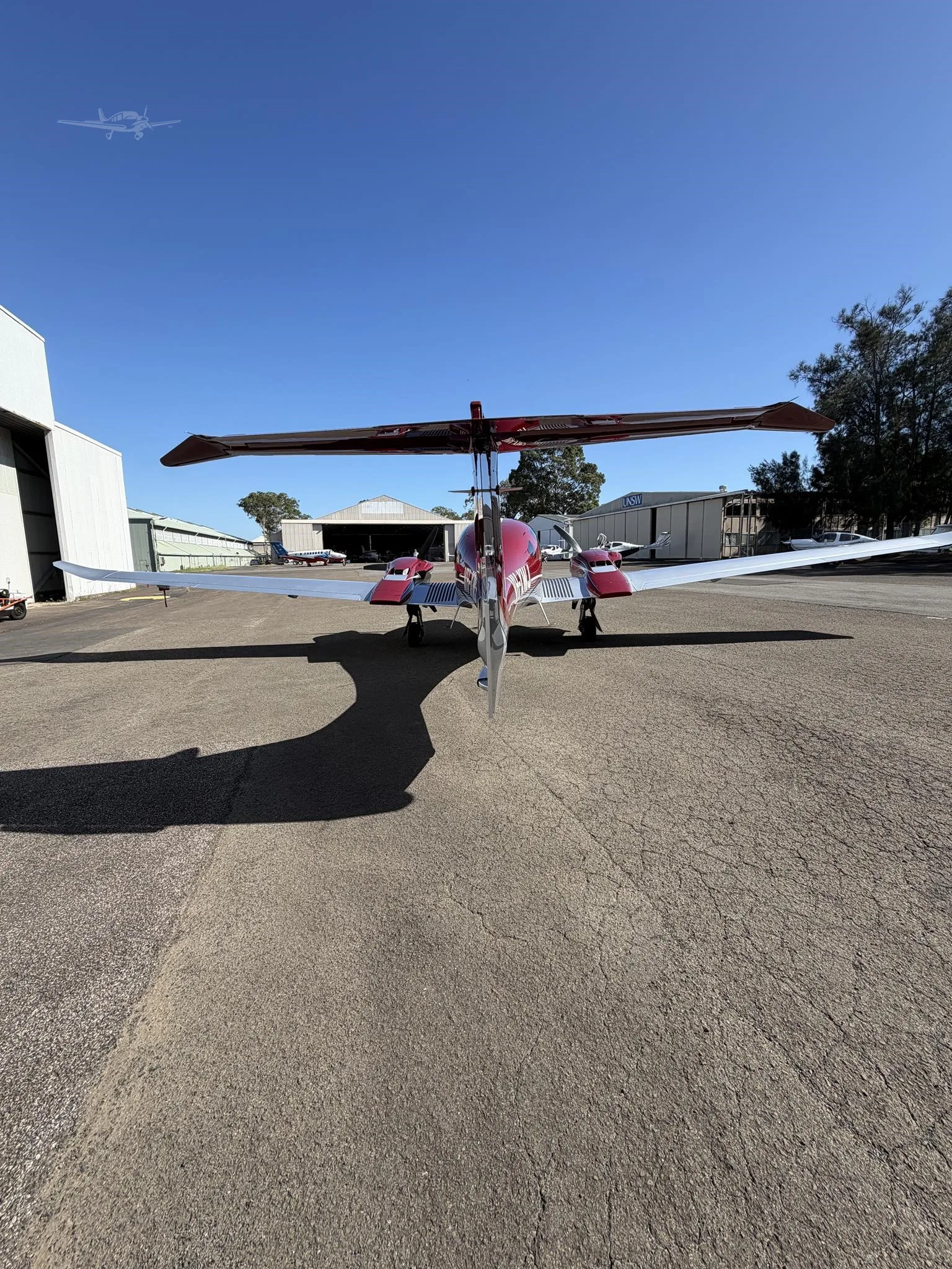 Exterior view of a 2022 DIAMOND DA62, VH-XWJ.