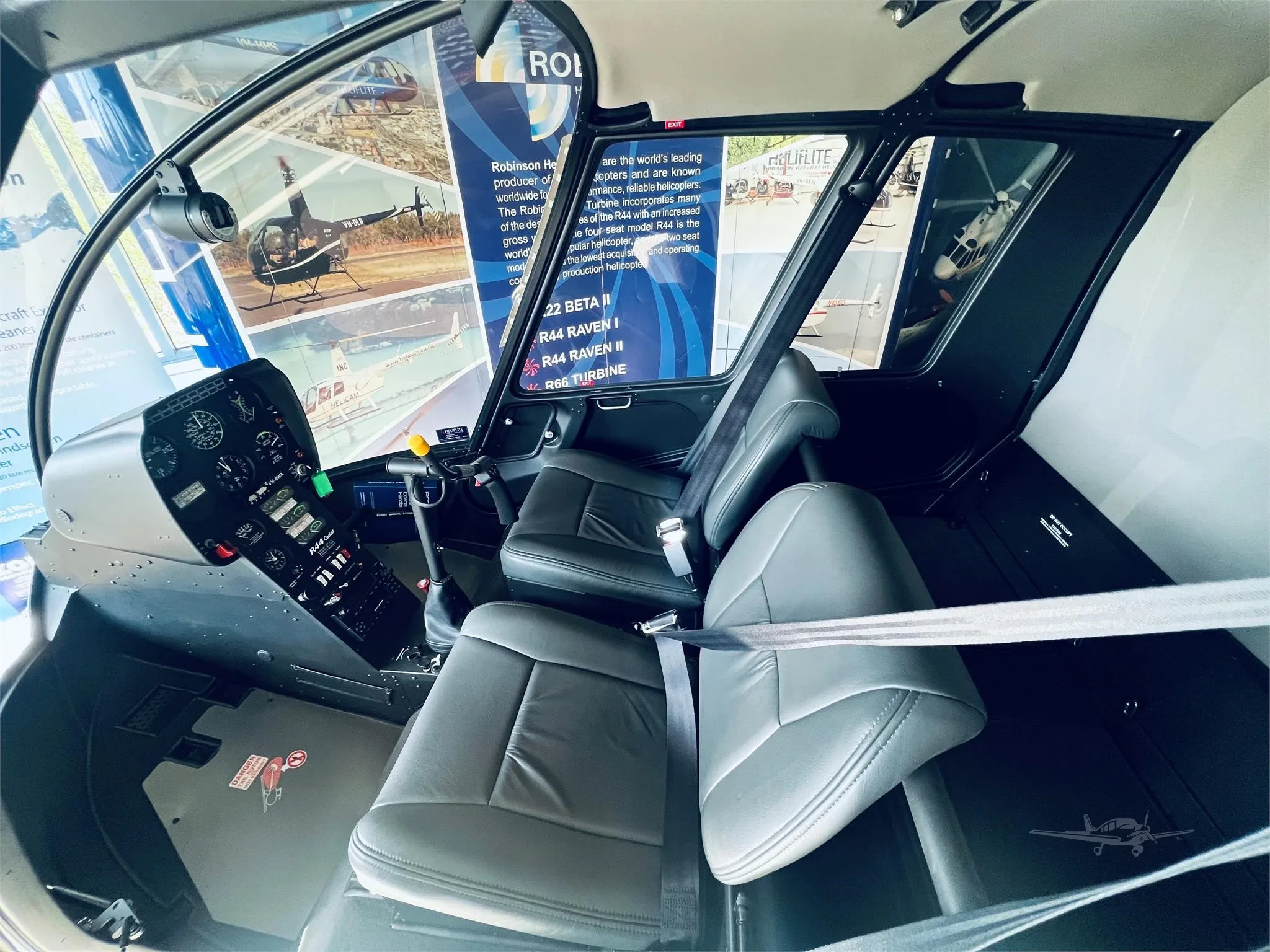 Cockpit and instrument panel of a 2026 ROBINSON R44 CADET.