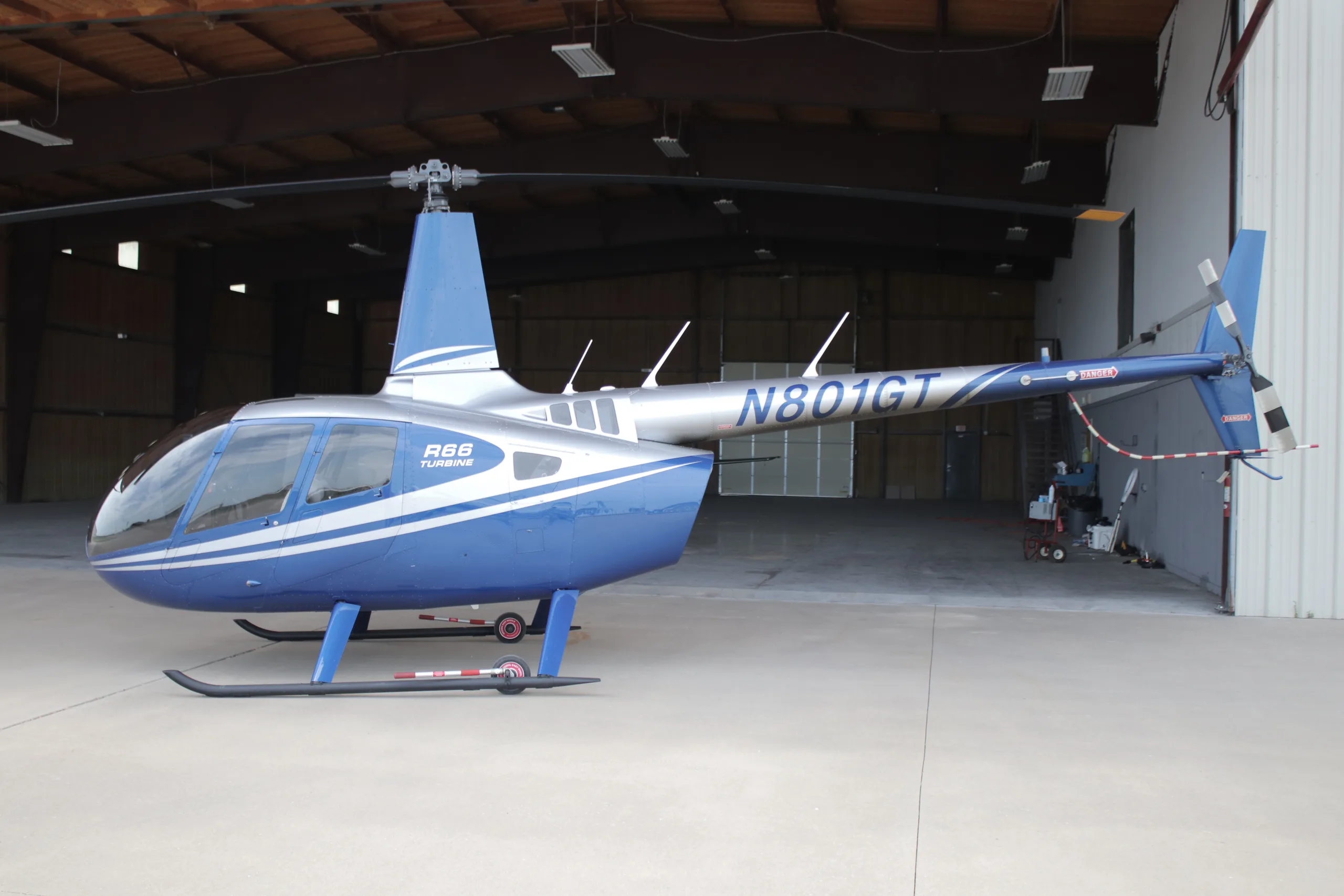 Exterior view of a 2018 Robinson R66 0891, N801GT.