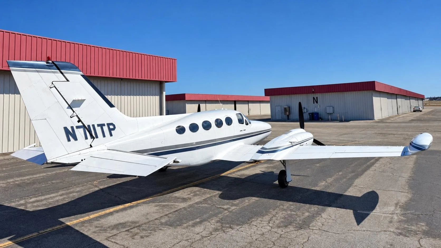 Exterior view of a 1973 CESSNA 421B, N711TP.