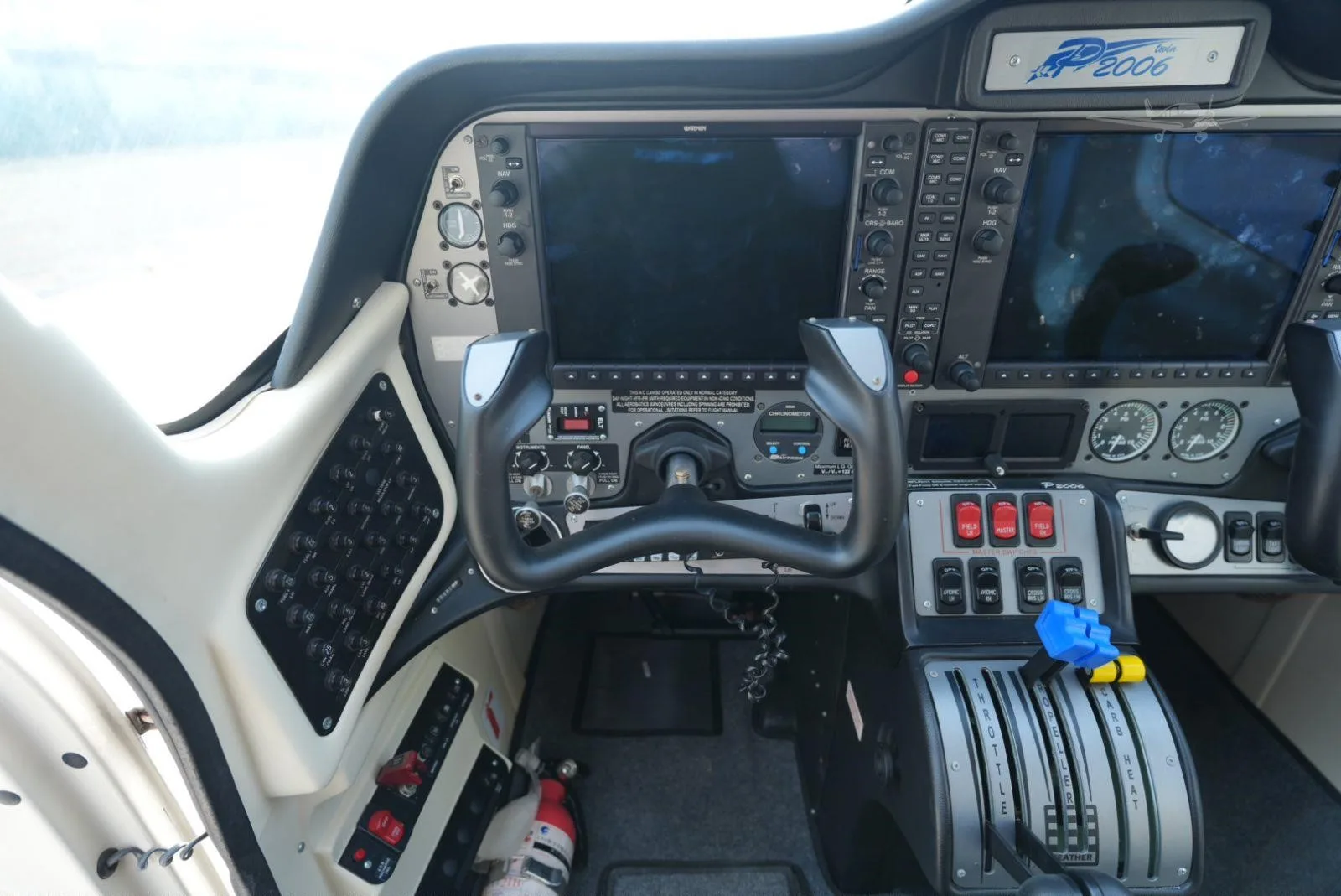 Cockpit and instrument panel of a 2019 TECNAM P2006T.