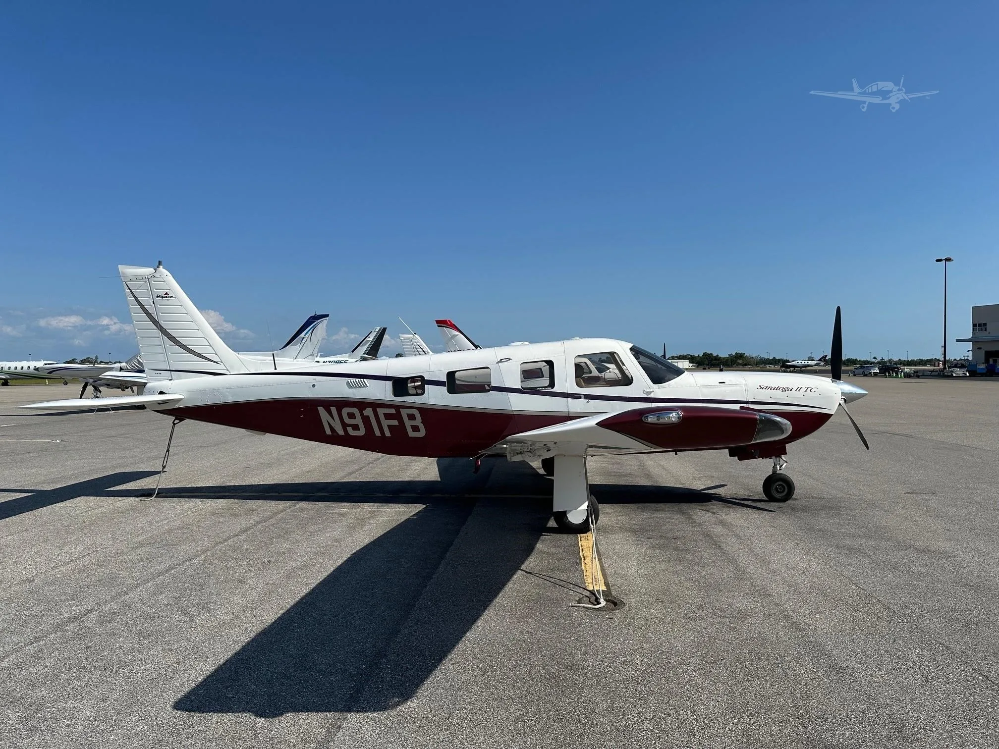 Exterior view of a 2003 PIPER SARATOGA II TC, N91FB.