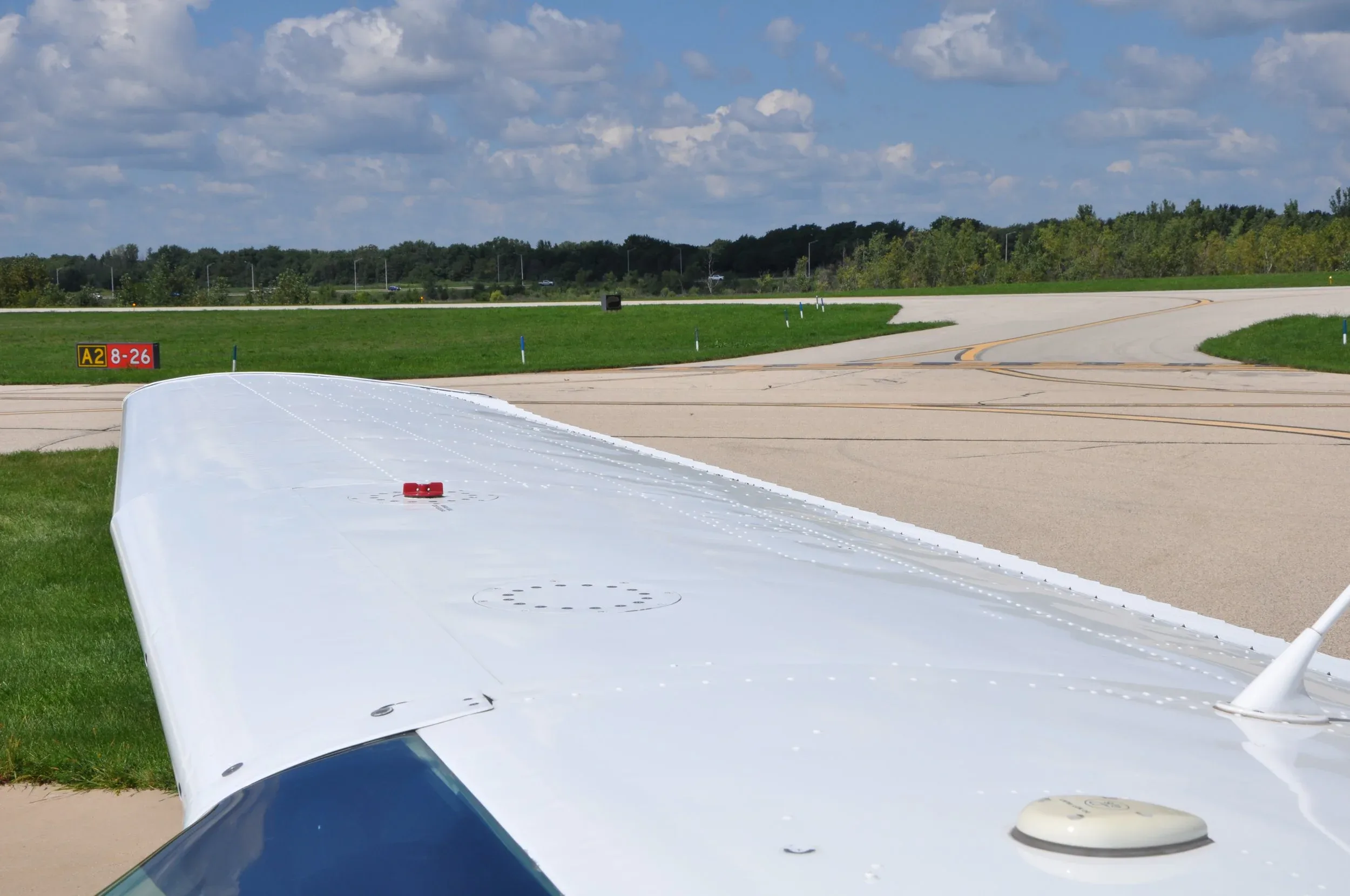 Exterior view of a 1976 AKC AVIATION 182P — AKC AVIATION.
