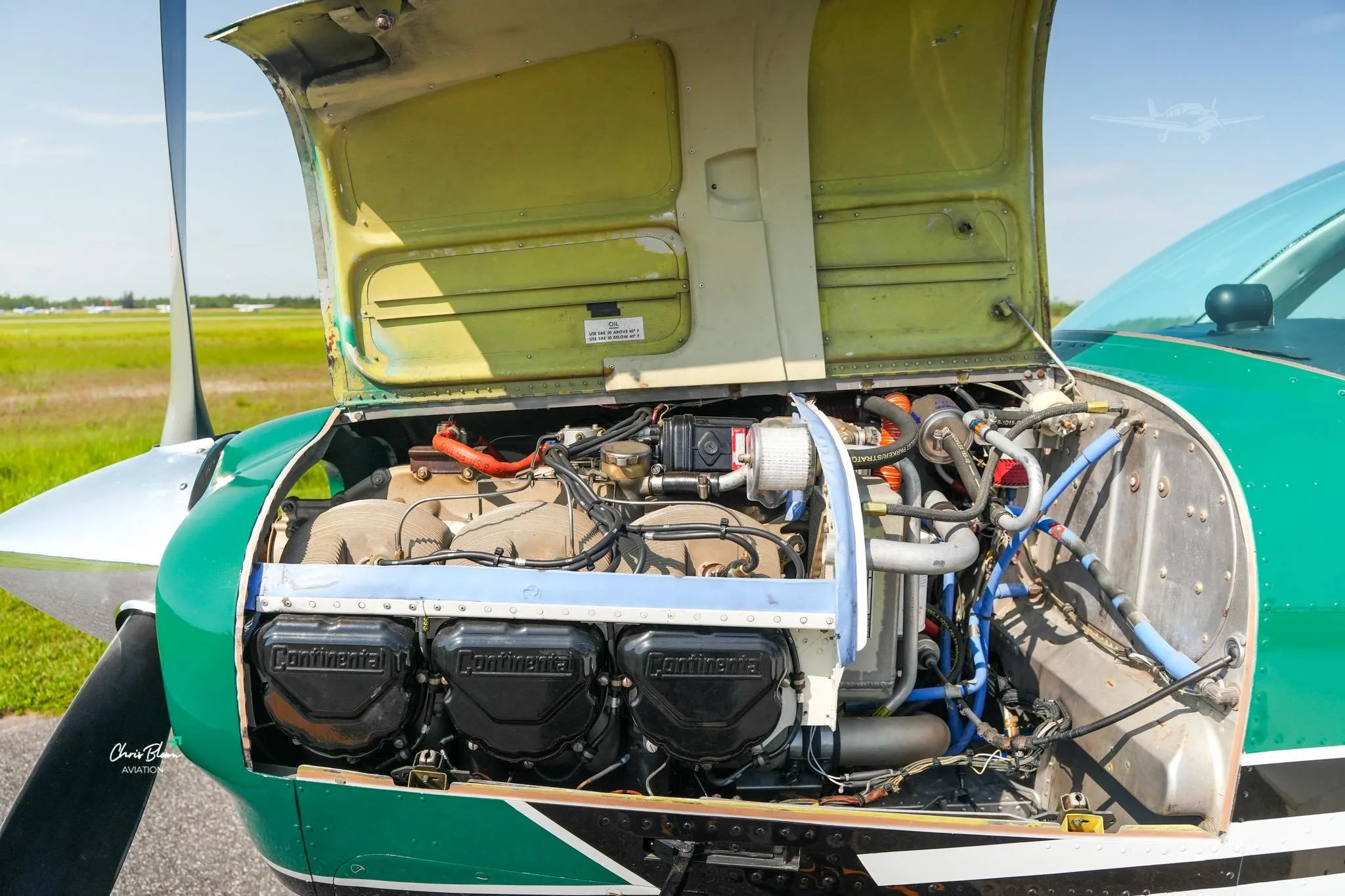 Engine detail of a 1976 BEECHCRAFT F33A BONANZA.