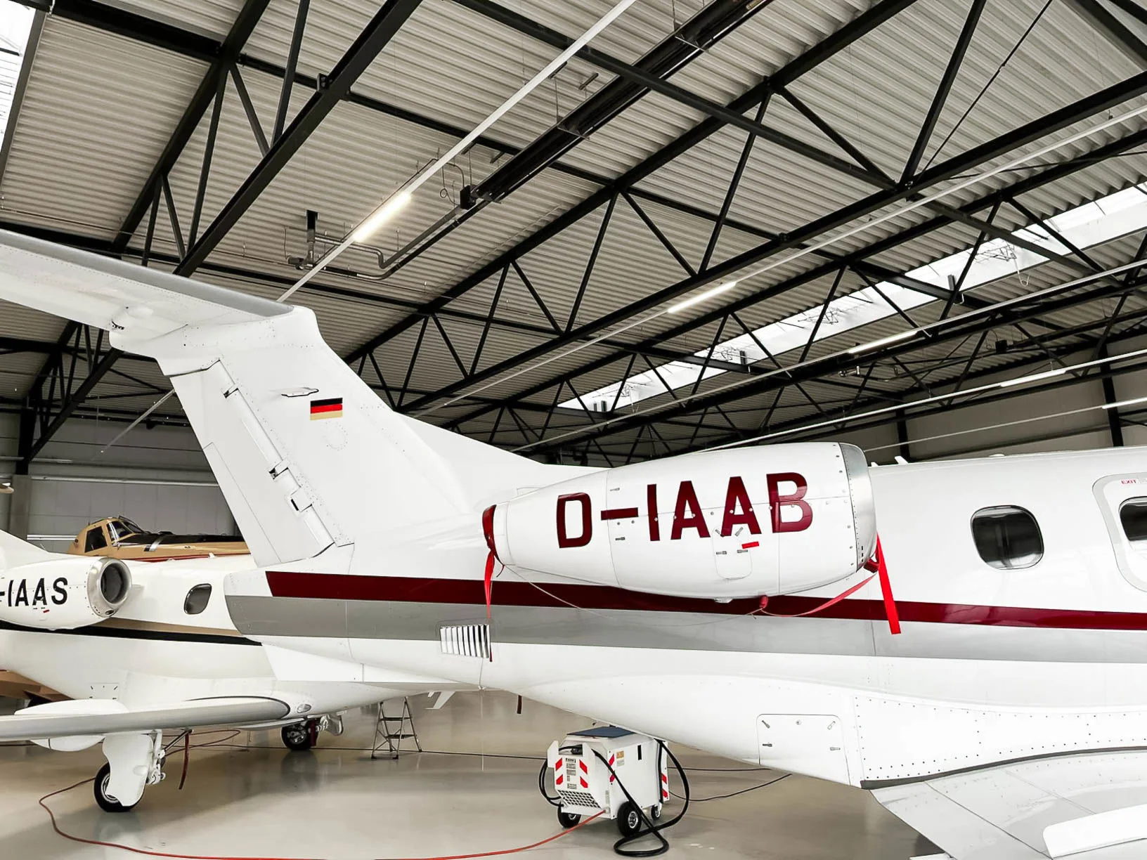 Exterior view of a 2010 Embraer Phenom 100, D-IAAB.