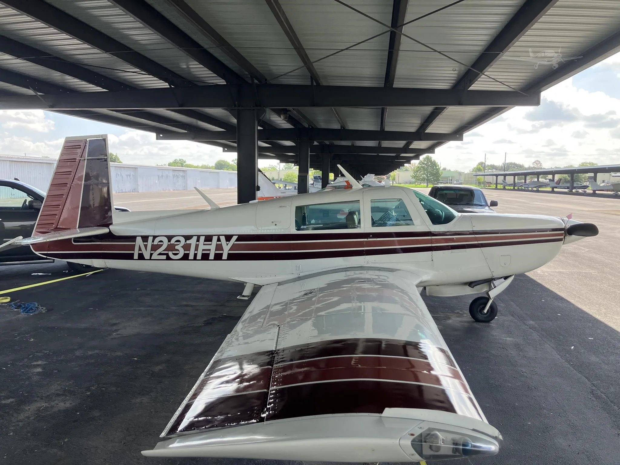 Exterior view of a 1980 MOONEY M20K 231, N231HY.
