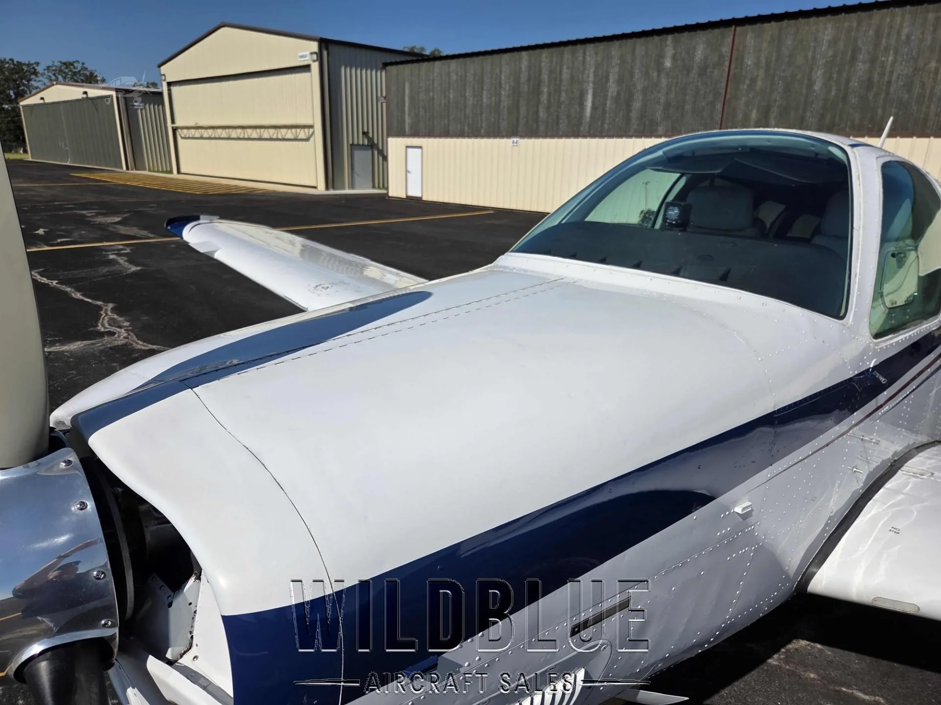 Exterior view of a 1999 BEECHCRAFT A36 BONANZA, N316P.