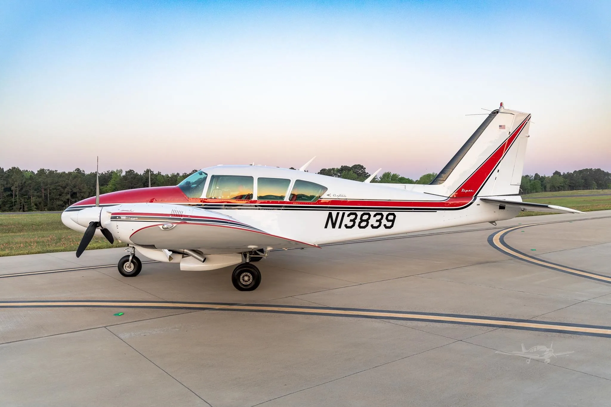 Exterior view of a 1970 PIPER TURBO AZTEC D, N13839.