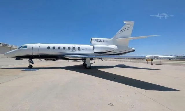 Exterior view of a 2000 DASSAULT FALCON 50EX, N313TT.
