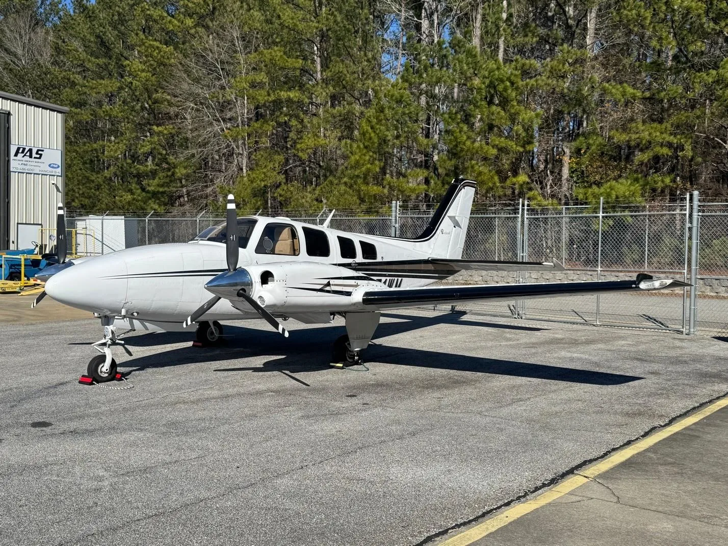 Exterior view of a 1985 BEECHCRAFT 58P BARON, N491WM.