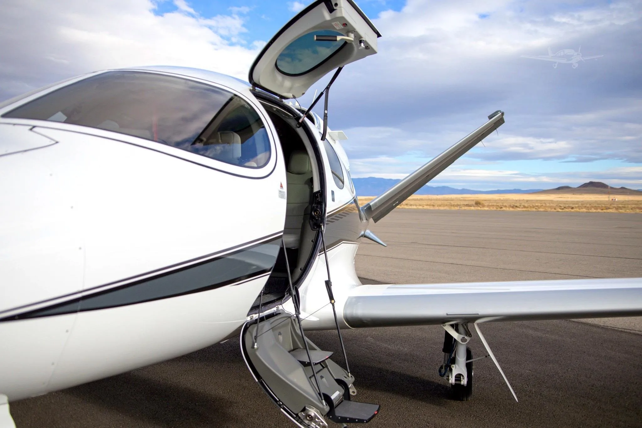 Exterior view of a 2022 CIRRUS VISION SF50-G2+, N27G.
