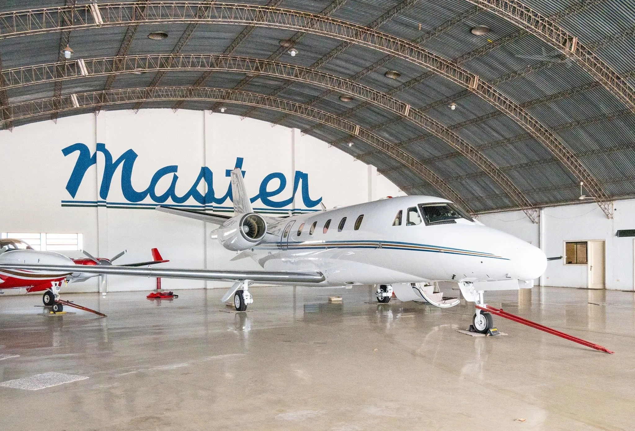 Exterior view of a 1998 CESSNA CITATION EXCEL, ZP-ADE.