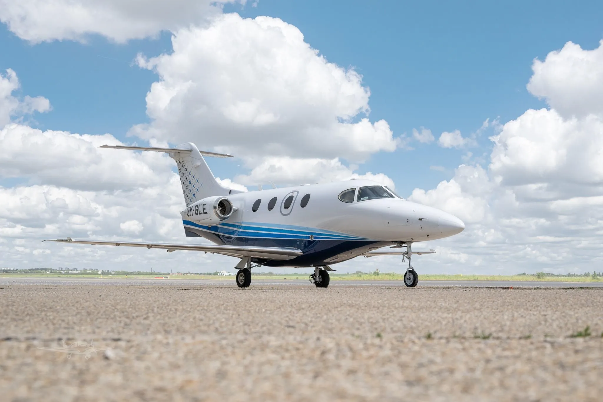 Exterior view of a 2007 BEECHCRAFT PREMIER IA, OM-GLE.