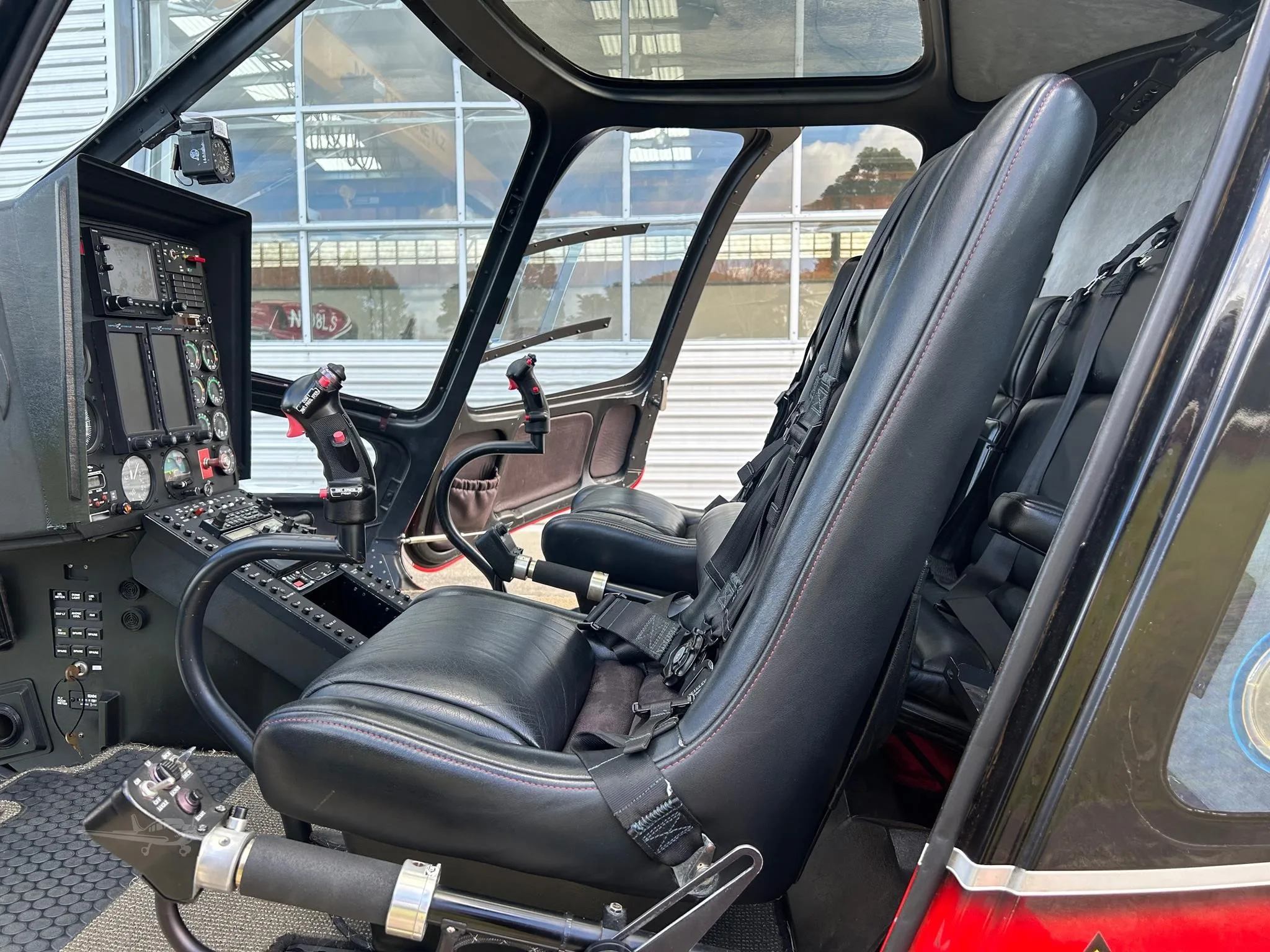 Cockpit and instrument panel of a 2006 ENSTROM 480B TURBINE.