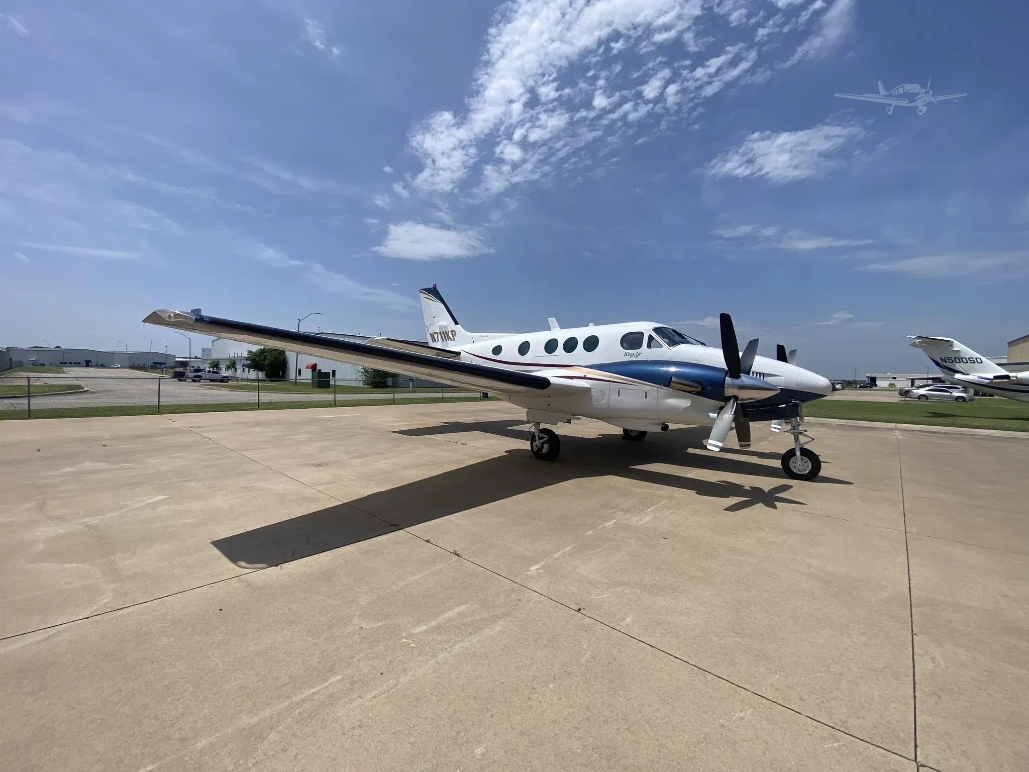 Exterior view of a 1976 BEECHCRAFT KING AIR C90, N711KP.