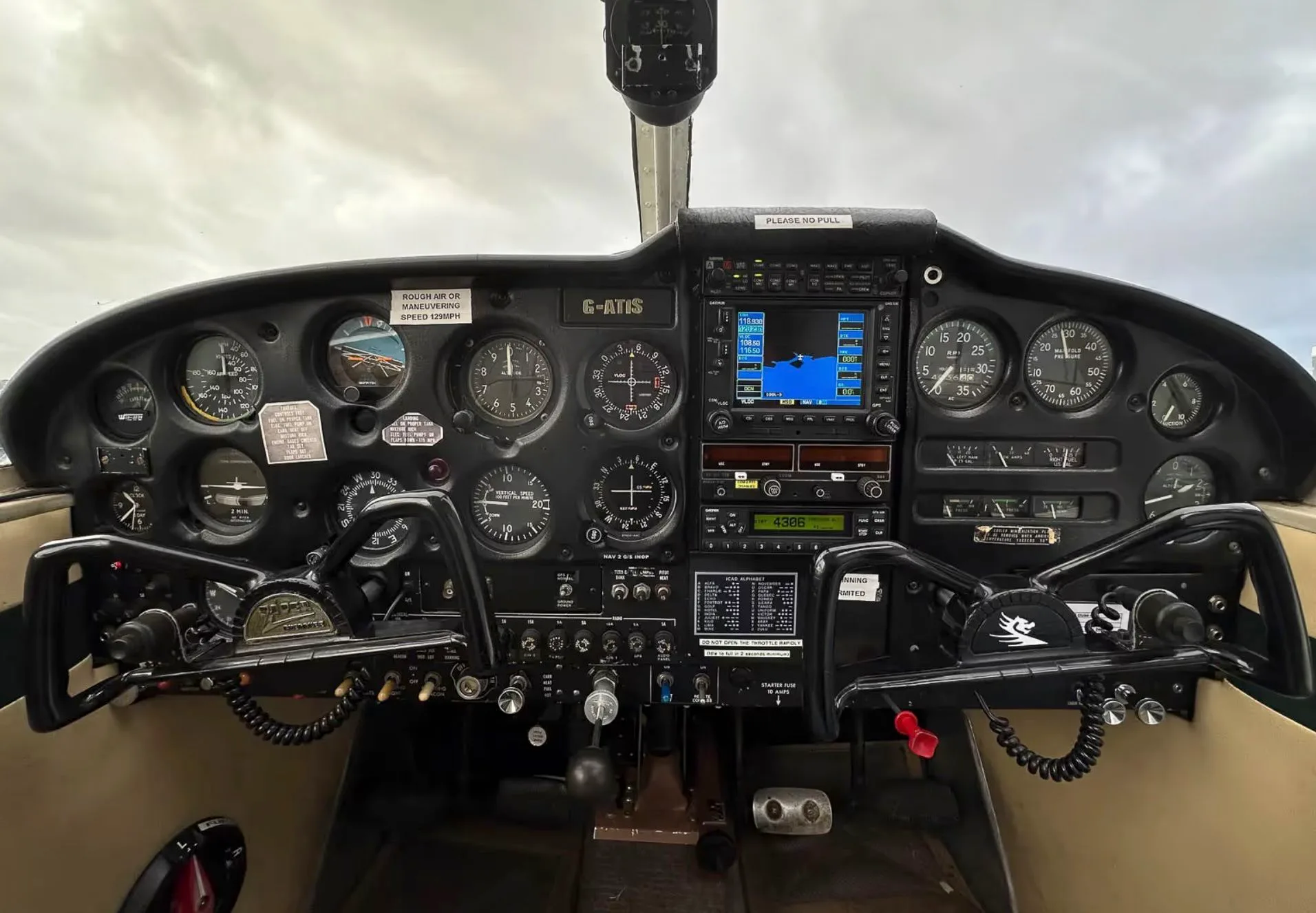 Cockpit and instrument panel of a 1965 Piper PA-28-160 Cherokee.