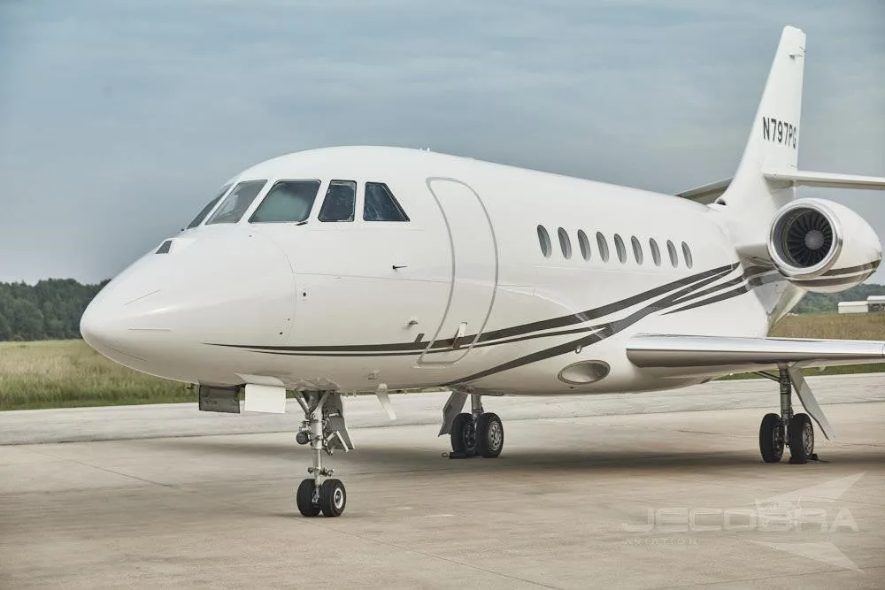 Exterior view of a 2006 DASSAULT FALCON 2000LX, N797PG.