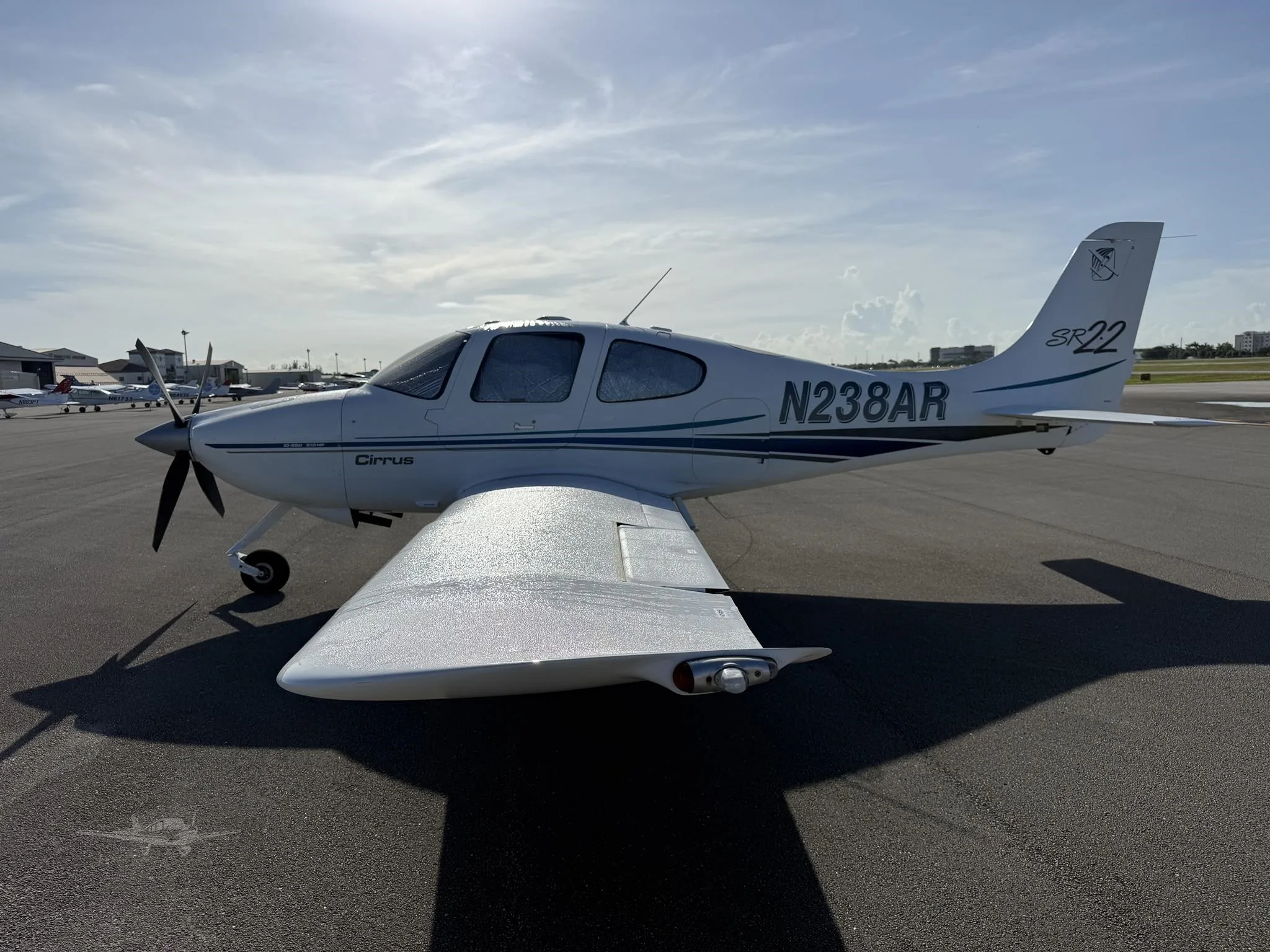 Exterior view of a 2002 CIRRUS SR22, N238AR.