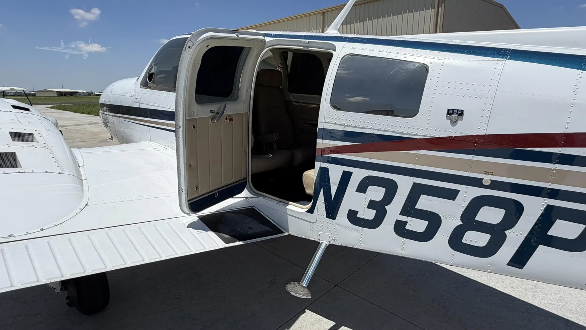 Exterior view of a 1977 BEECHCRAFT 58P BARON, N358PB.