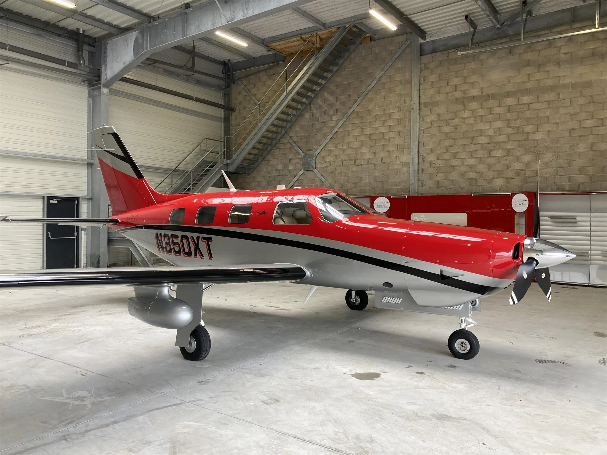 Exterior view of a 2016 PIPER M350, N350XT.