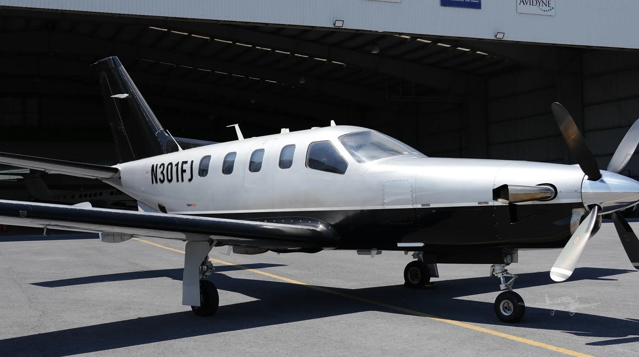 Exterior view of a 2008 DAHER TBM 850, N301FJ.