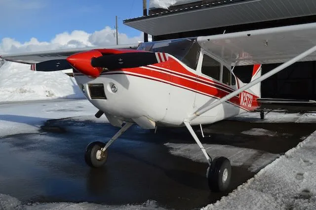Exterior view of a 1963 Cessna 180F, N25722.