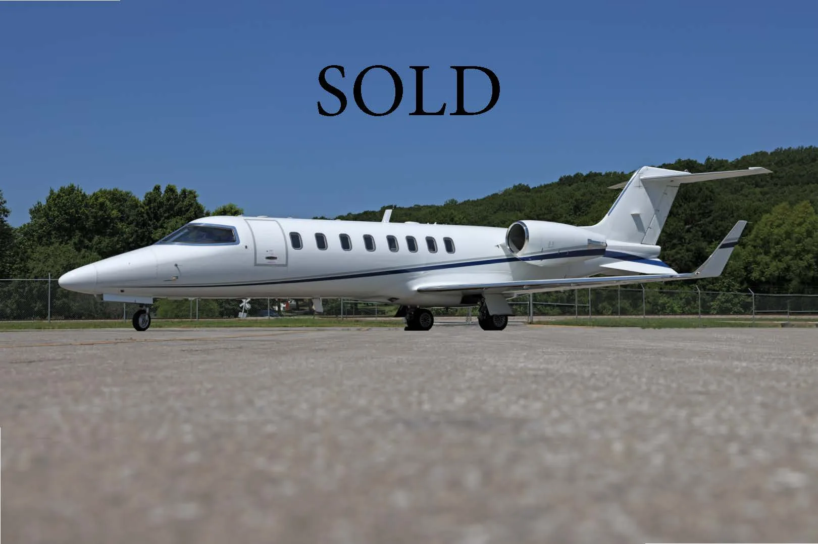 Exterior view of a 2002 Learjet 45, N769TM.