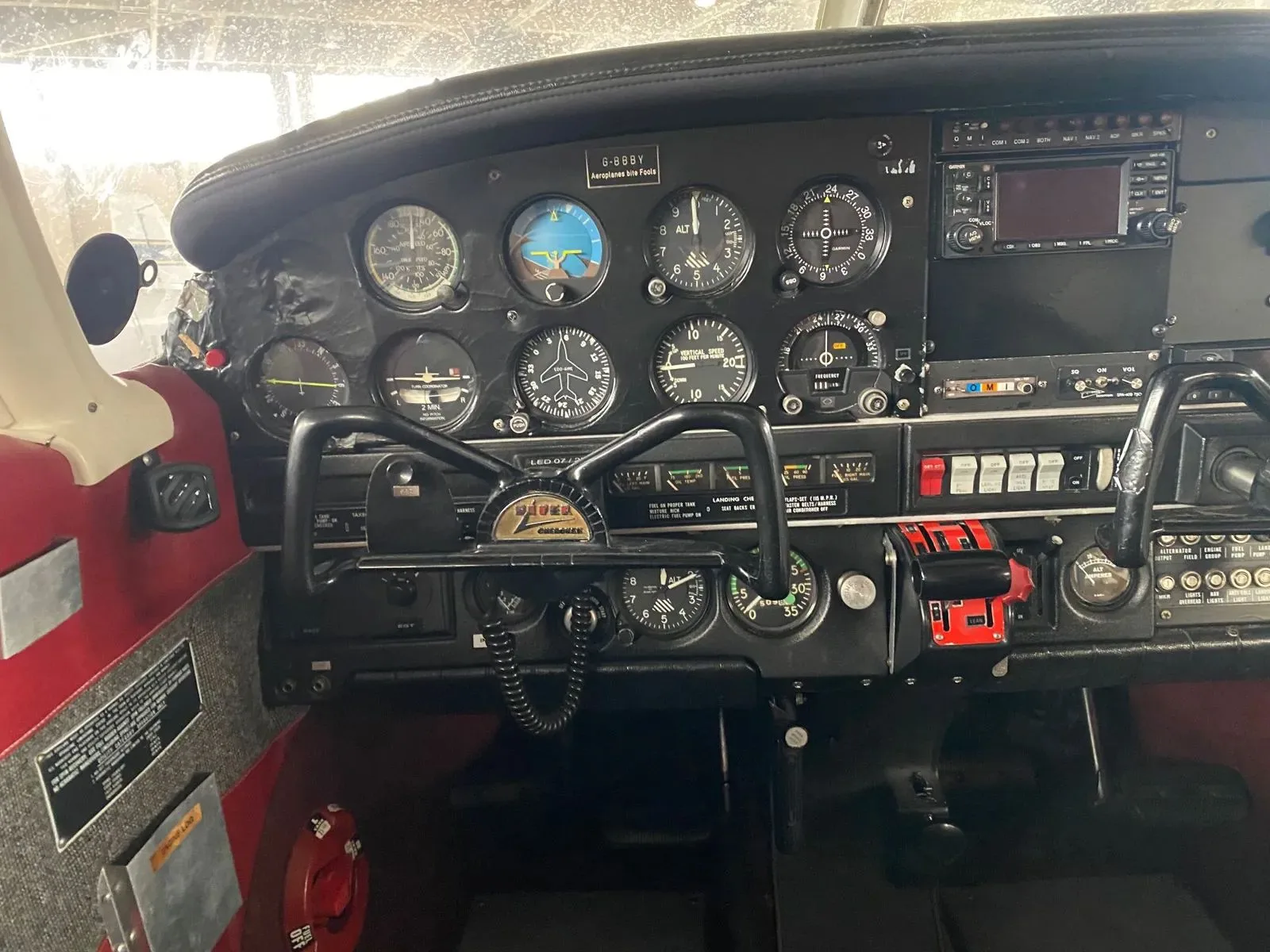 Cockpit and instrument panel of a 1973 Piper PA-28-140 Cherokee.