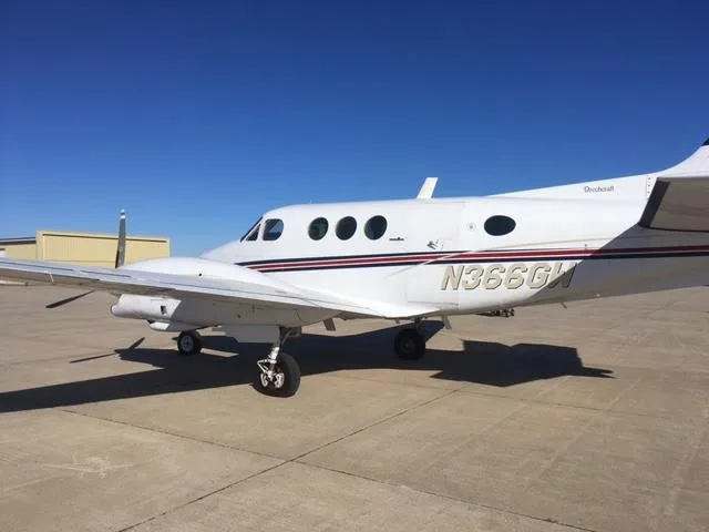 Exterior view of a 1979 BEECHCRAFT KING AIR E90, N366GW.