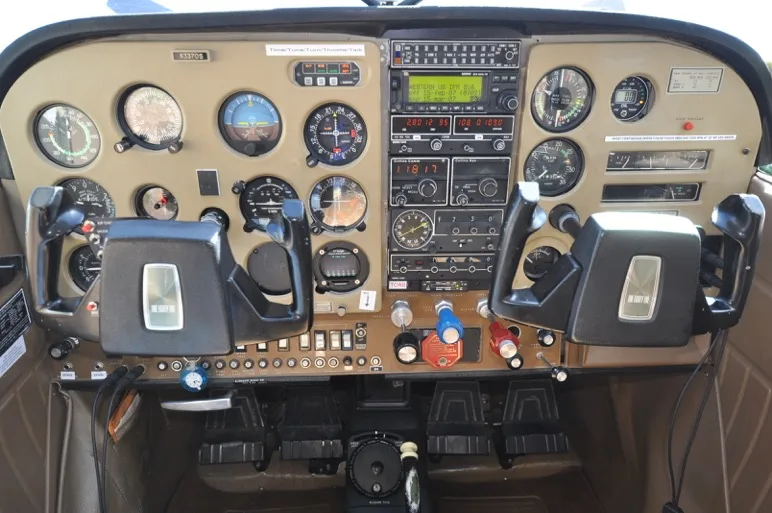 Cockpit and instrument panel of a 1973 Cessna 185F.