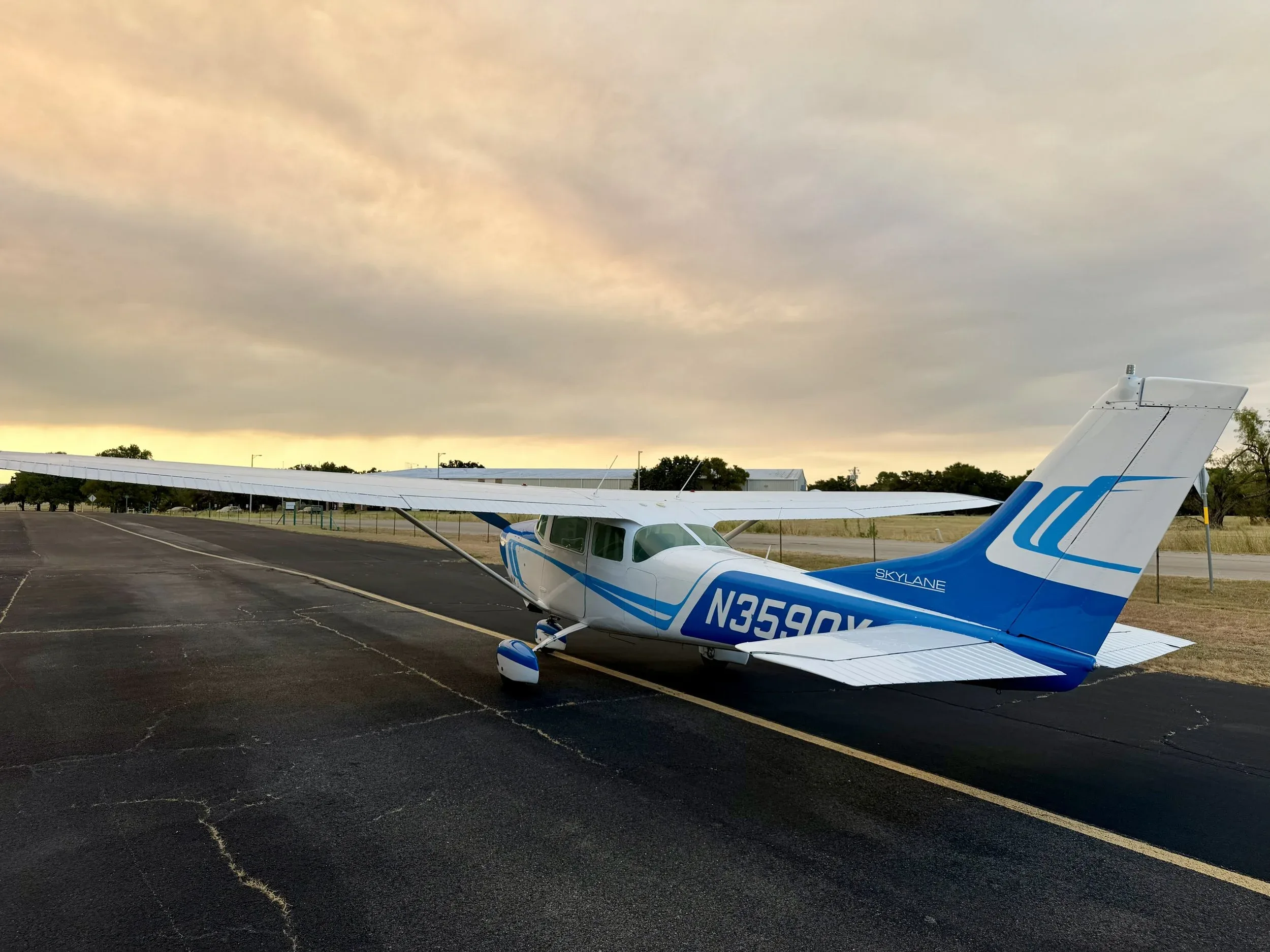 Exterior view of a 1963 Zane Co Aero 182F SKYLANE, N3590Y.