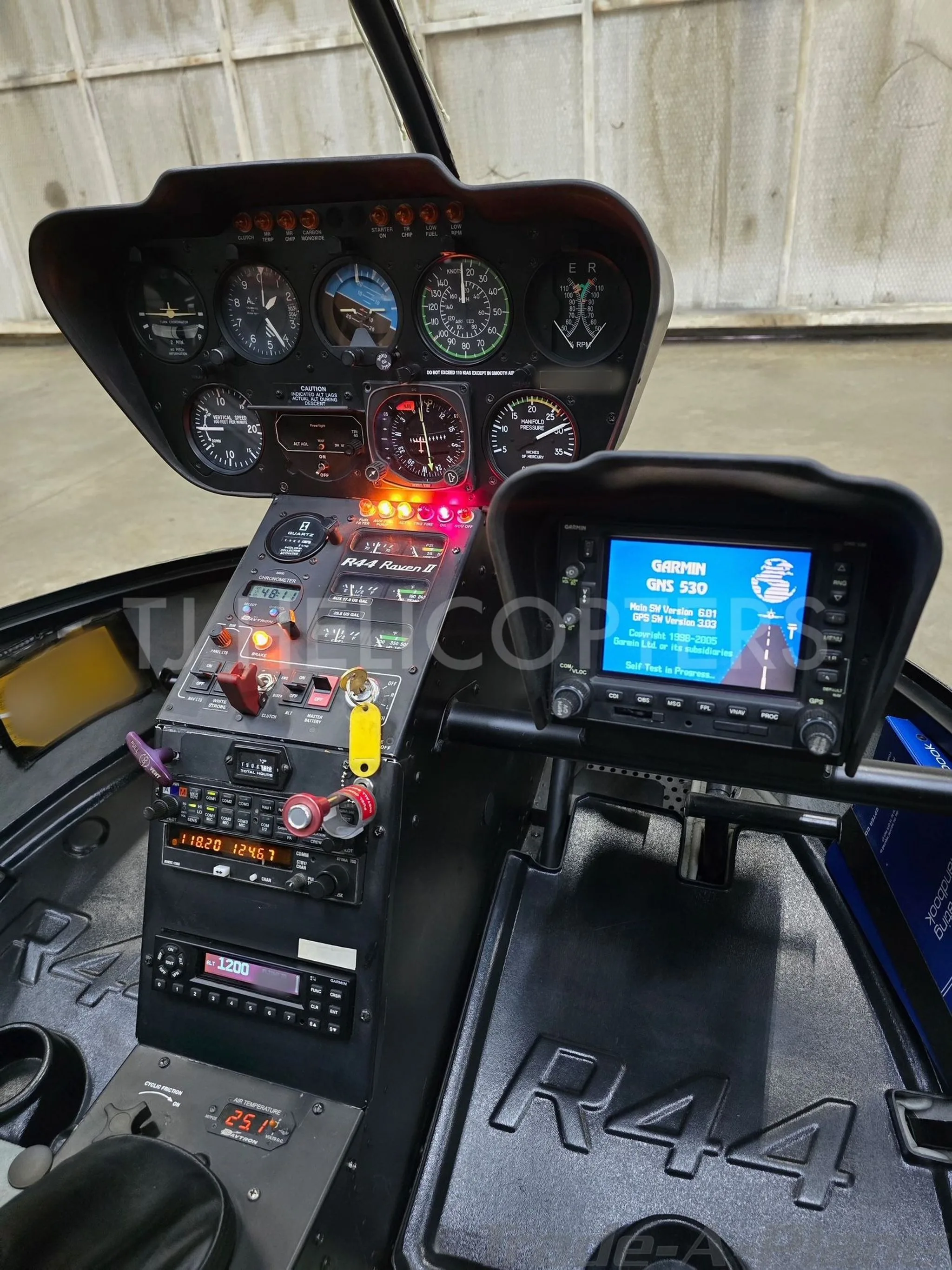 Cockpit and instrument panel of a 2007 ROBINSON R44 RAVEN II.