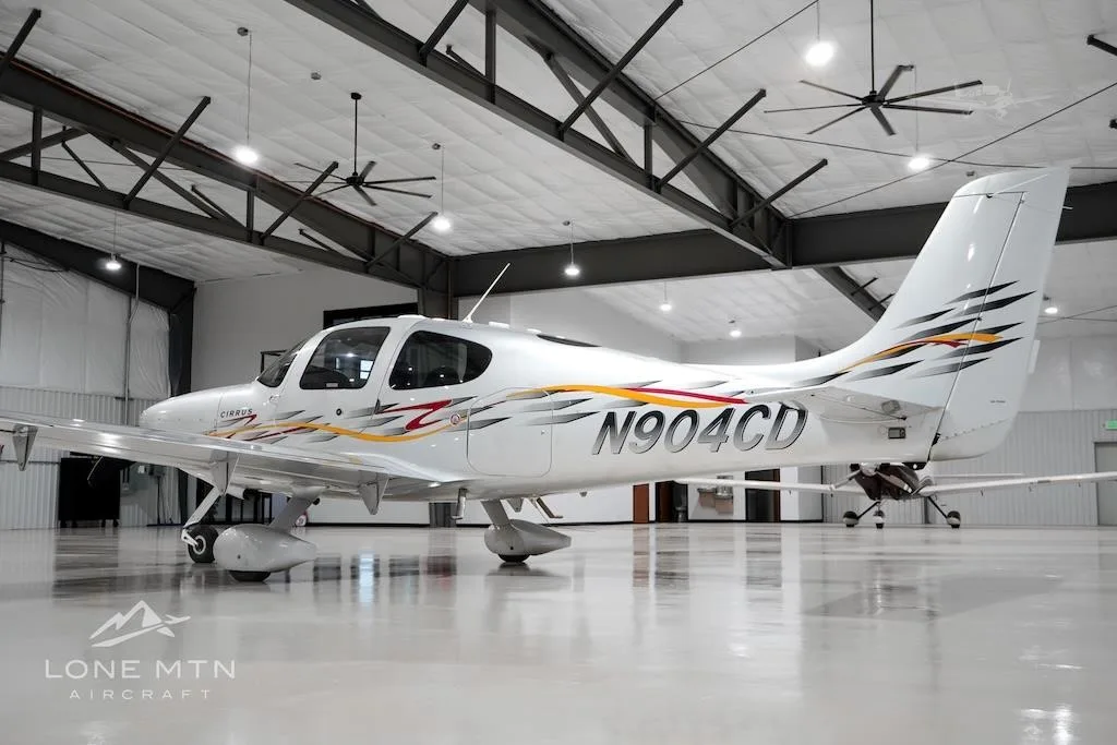 Exterior view of a 2006 CIRRUS SR22-G2 TURBO, N904CD.