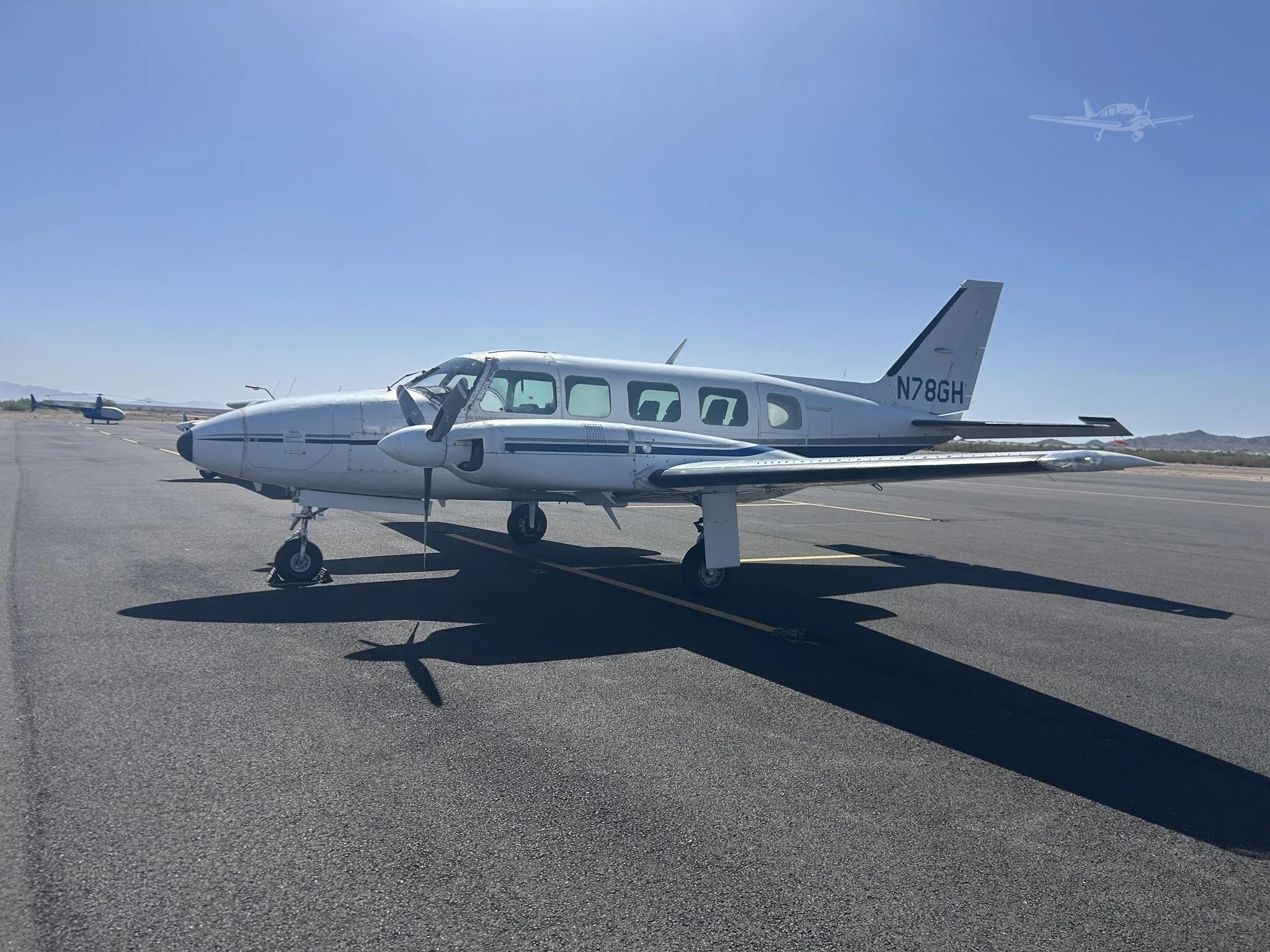 Exterior view of a 1978 PIPER NAVAJO CHIEFTAIN, N78GH.