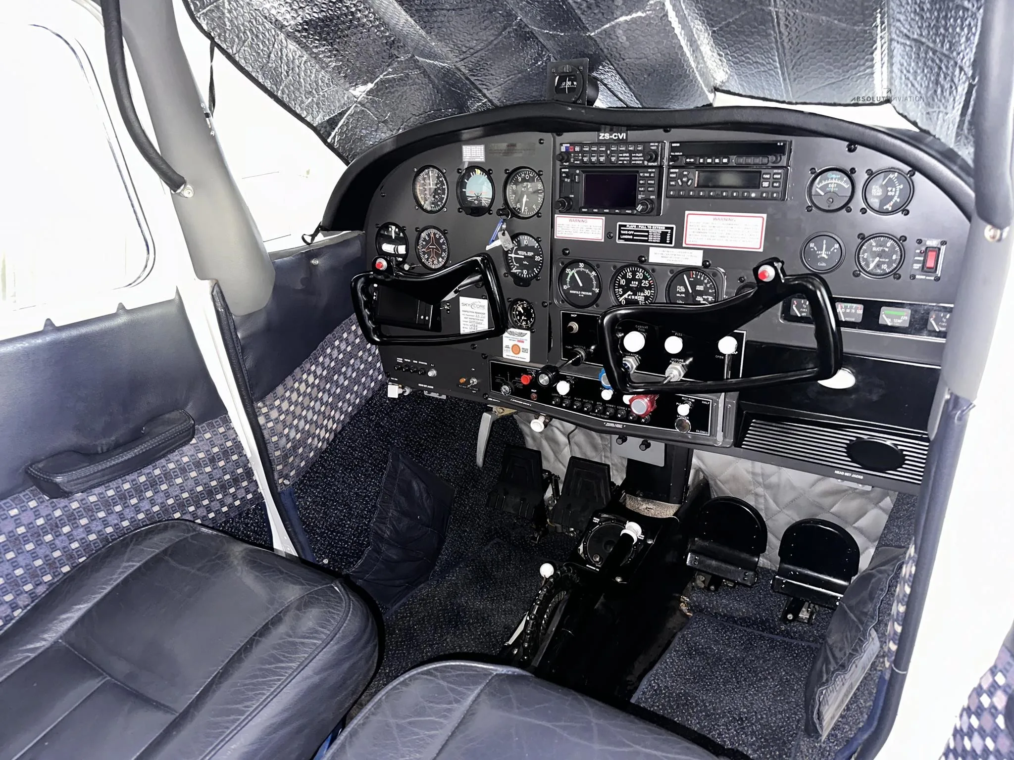 Cockpit and instrument panel of a 1962 CESSNA 185.