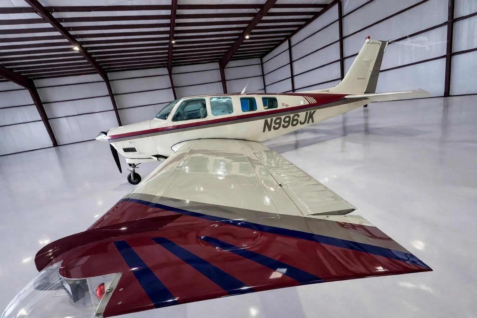 Exterior view of a 1996 BEECHCRAFT A36 BONANZA, N996JK.