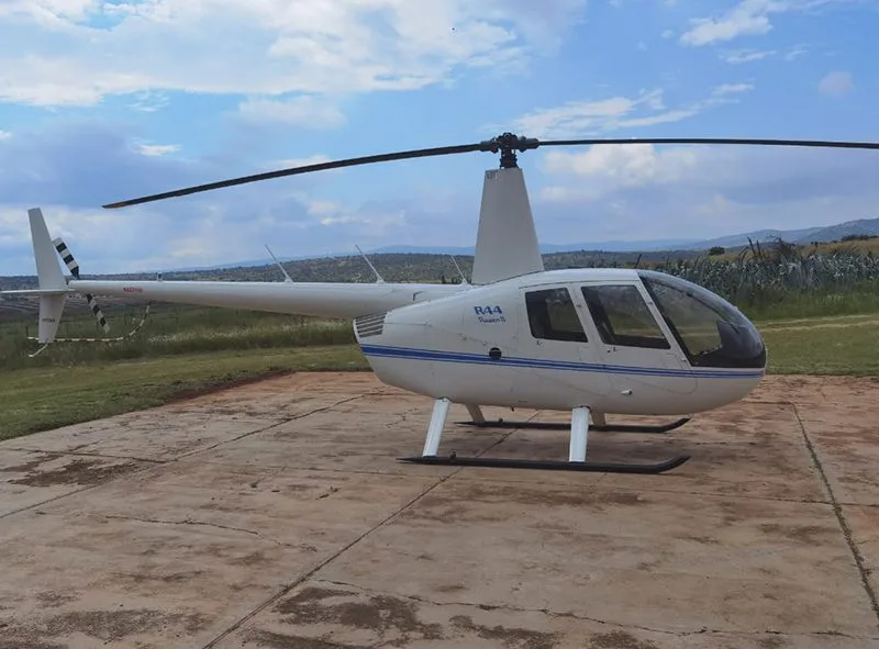 Marketing image of a 2013 Robinson R44 Raven II.