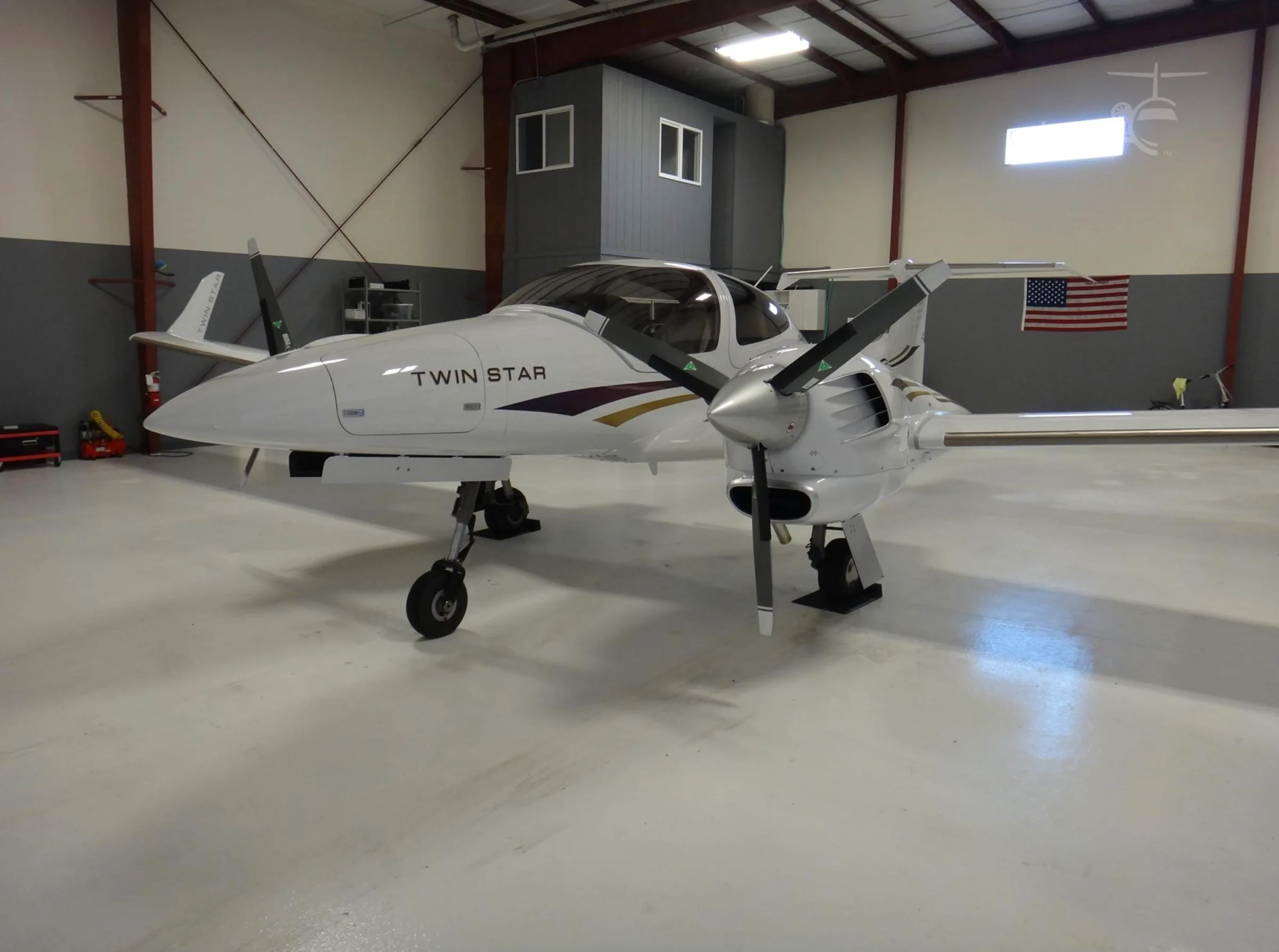 Exterior view of a 2007 Diamond DA42 Twin Star, G-COMS.