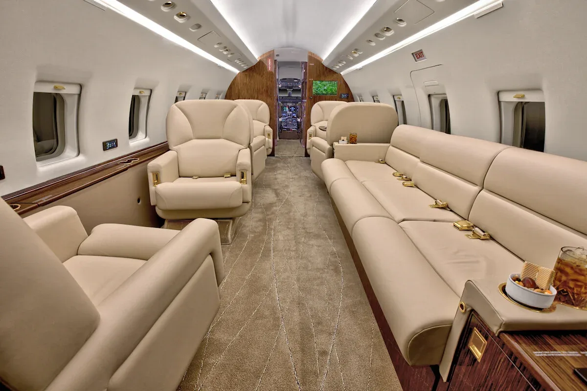 Cabin interior of a 1997 Bombardier Challenger 604 — Thoroughbred Aviation.
