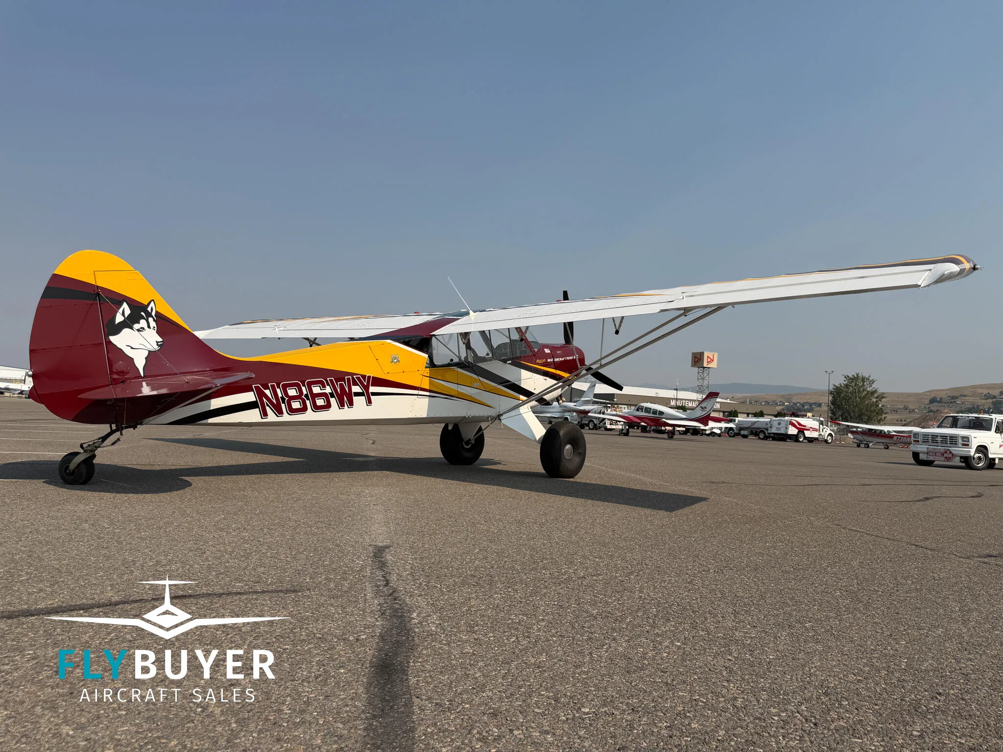 Exterior view of a 2012 Aviat A-1C-200 Husky.