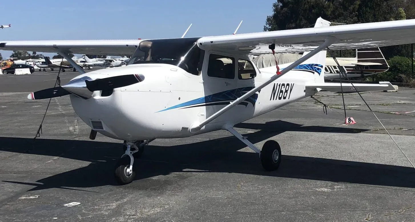 Exterior view of a 2021 Cessna 172S G1000, N168Y.