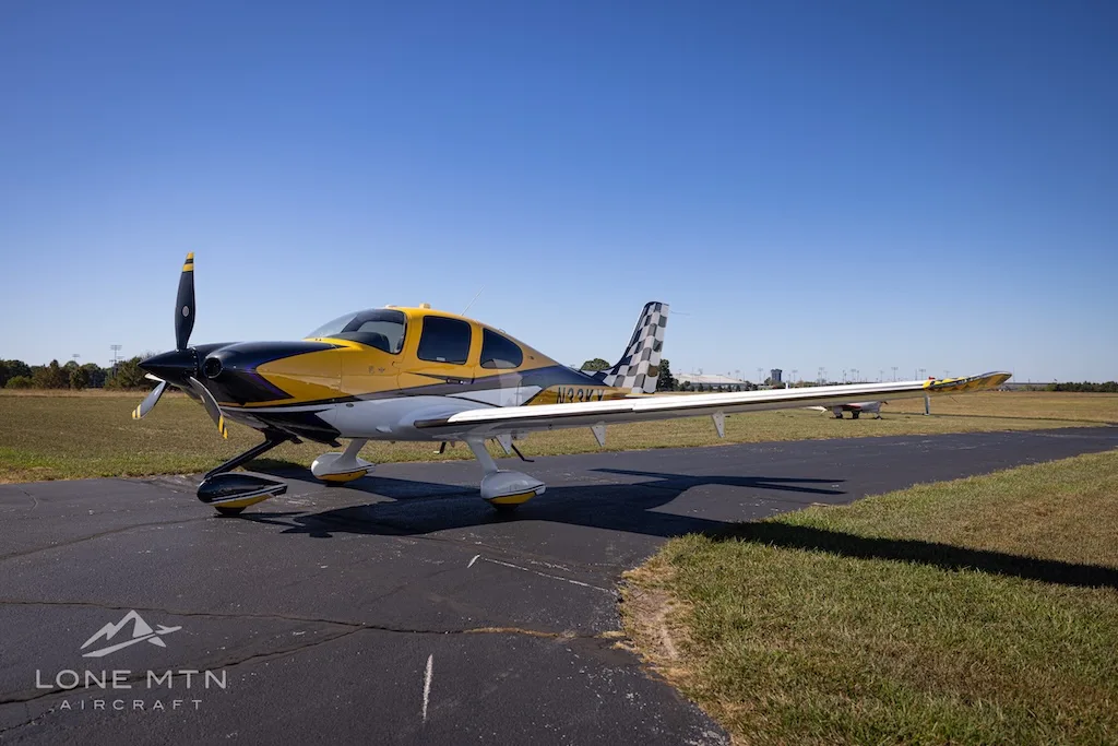 Exterior view of a 2021 Cirrus SR22T G6 GTS, N33KX.