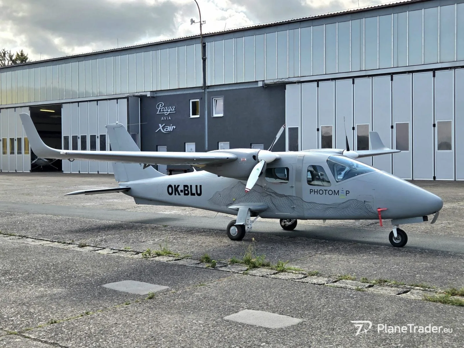 Exterior view of a 2010 Tecnam P2006T Survey.