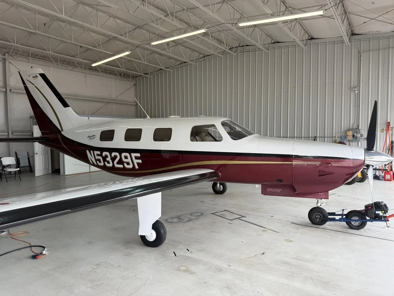Exterior view of a 2002 PIPER MALIBU MIRAGE, N5329F.