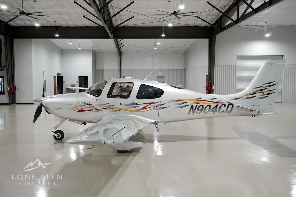 Exterior view of a 2006 CIRRUS SR22-G2 TURBO, N904CD.