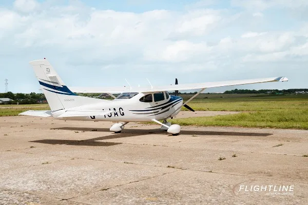 Exterior view of a 2005 Cessna 182T, G-IJAG.