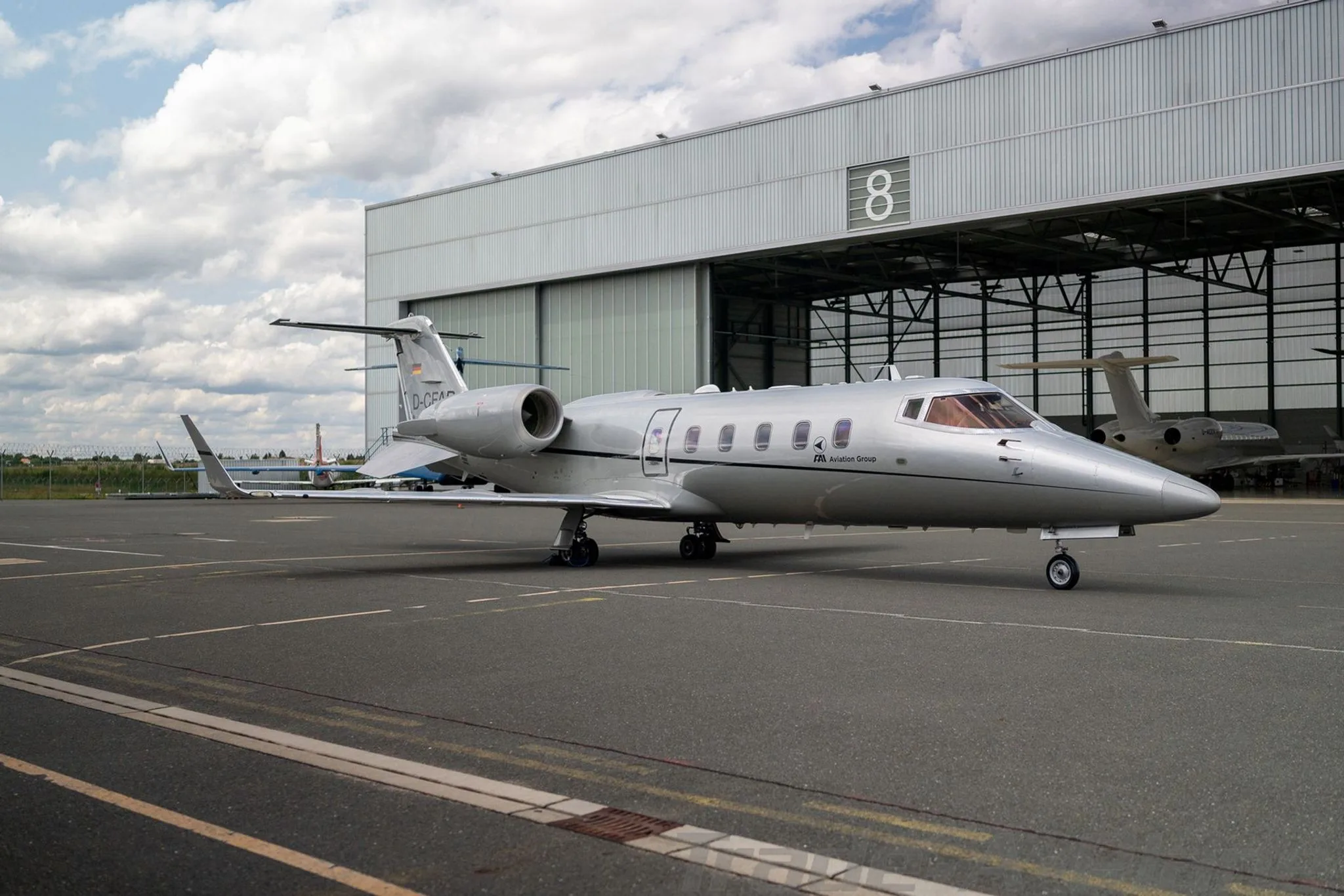 Exterior view of a 2011 LEARJET 60XR, D-CFAR.