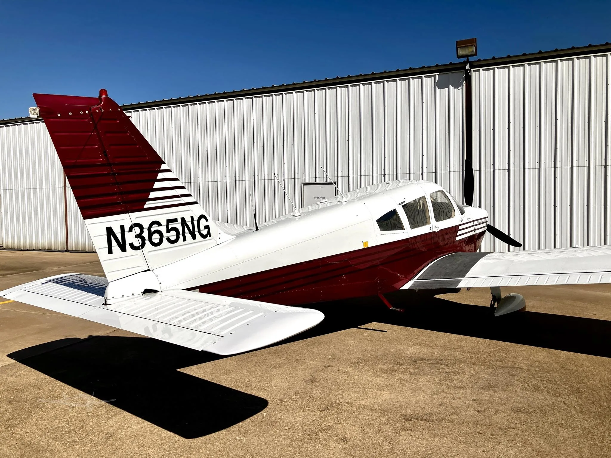 Exterior view of a 1968 PIPER CHEROKEE 235, N365NG.