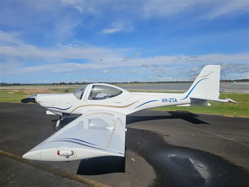 Exterior view of a 1995 Grob, VH-ZTA.