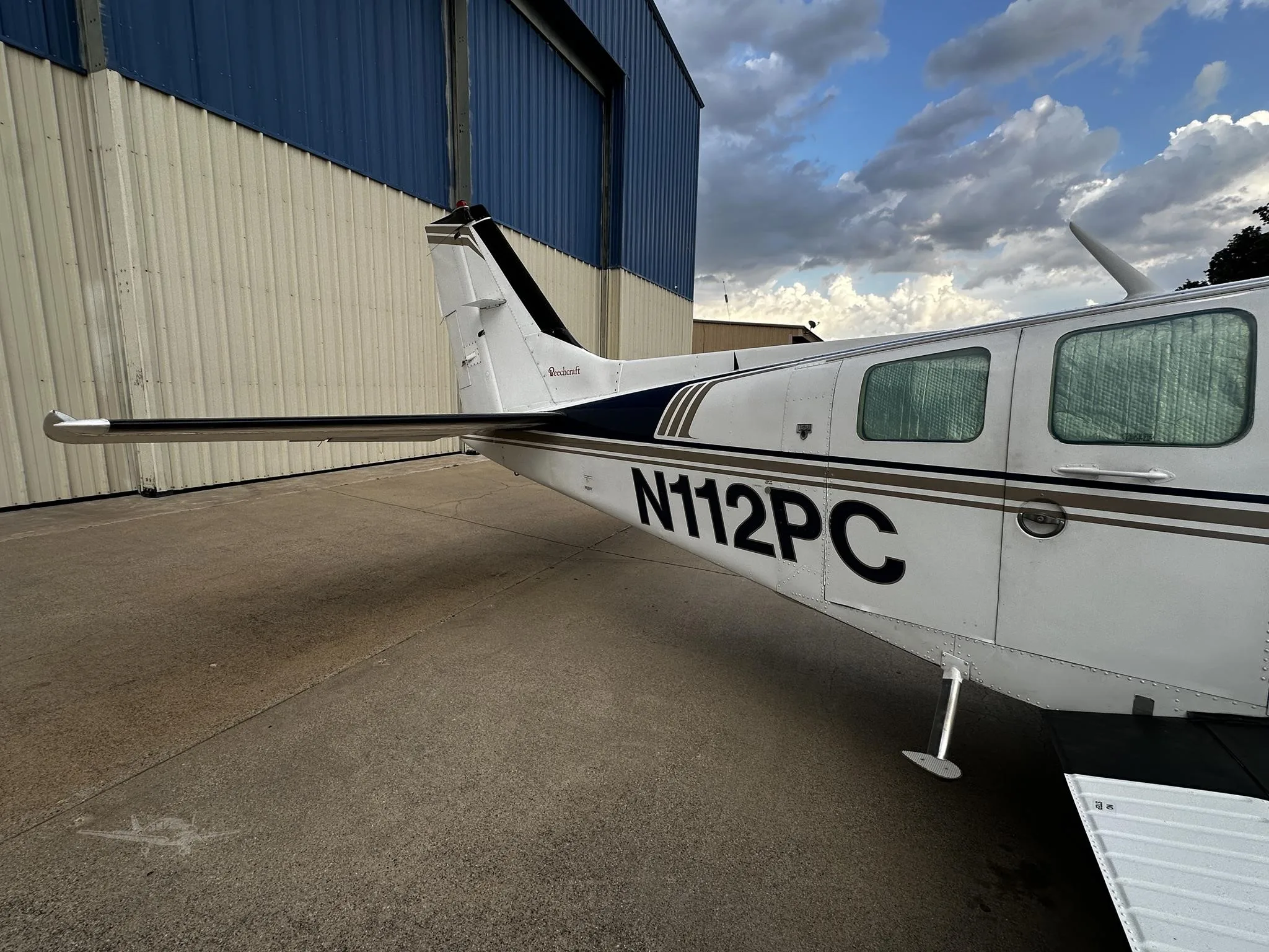 Exterior view of a 1976 BEECHCRAFT 58 BARON, N112PC.
